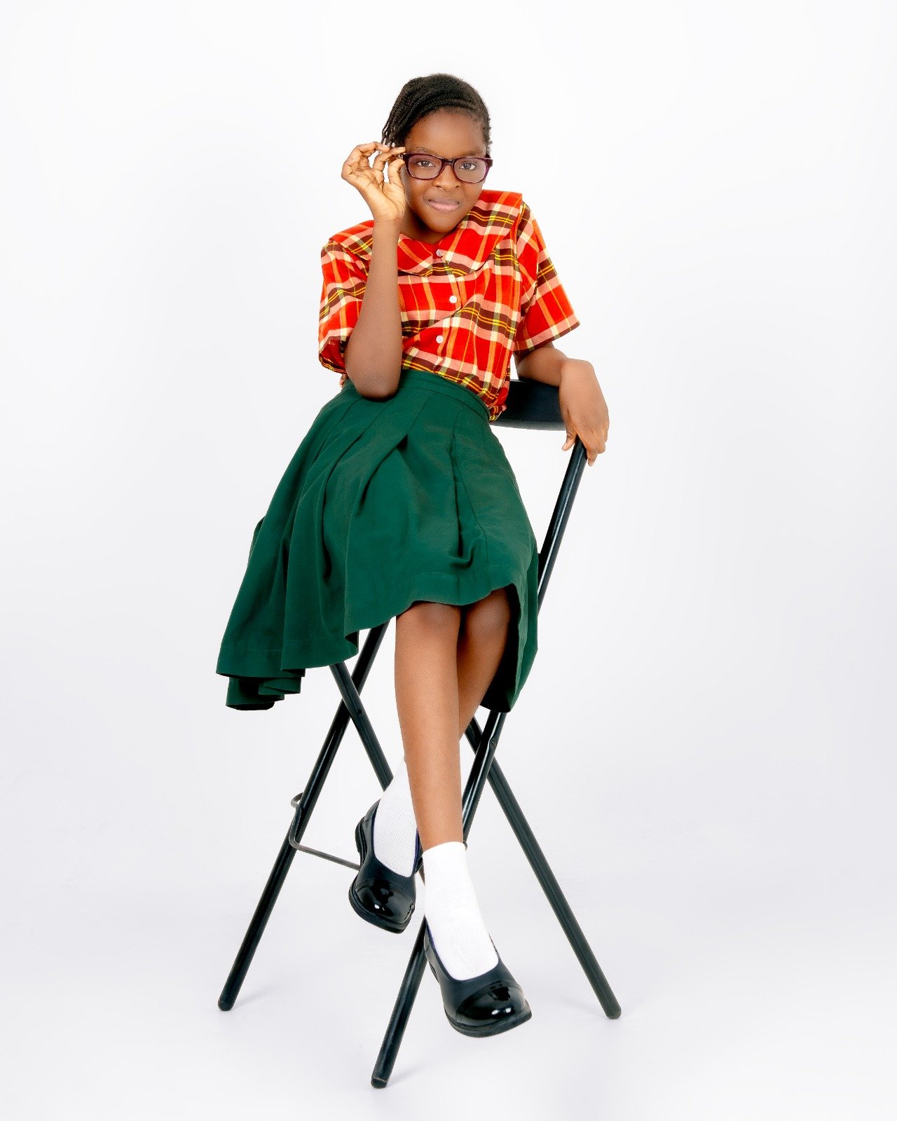 Student reading while wearing Hammond school shoes
